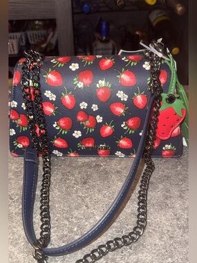 Steve Madden navy crossbody with red strawberry print